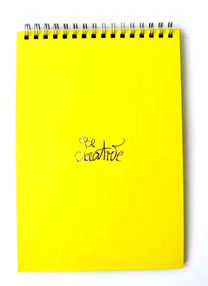 блокнот а5 64 аркушів на пружині зверху title office yellow