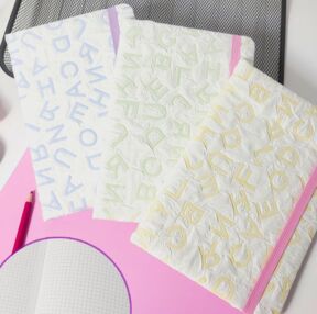 Блокнот А5 80 аркушів у клітинку тканевий на резинці в асортименті 21-6